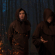 Illustration for article titled Robed Mark Warner Infiltrates Secret Torchlit AHCA Ceremony Deep In Woods Behind Capitol
